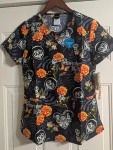 DISNEY Coco Cherokee Scrubs *Tooniforms* ORIGINAL V-Neck Top Ladies XS BNWT!! - Picture 1 of 15