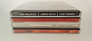 Lot 4 The Beatles CDs Abbey Road Sgt. Paprika Paul McCartney Blumen im Dreck - Bild 1 von 6