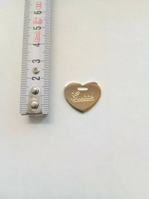 GUCCI CIONDOLO-PENDAGLIO GUCCI ORIGINALE FORMA CUORE ARGENTO NUOVO - Immagine 1 di 2