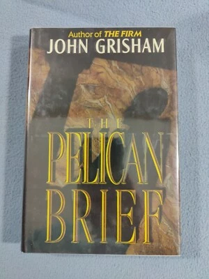**SIGNED** THE PELICAN BRIEF BY: JOHN GRISHAM 2ND EDITION HARDCOVER HC DJ BOOK - Image 1 of 4