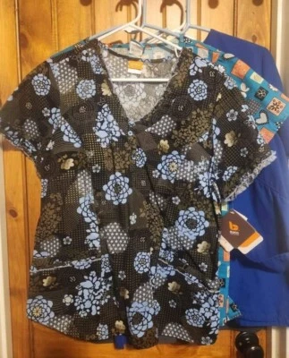 13 scrub tops Most brand new, some still have tags. - Image 1 of 4