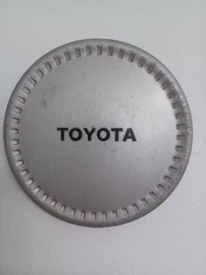 Tapa central de llanta de fábrica Toyota Corolla 1986-1992 OEM 4 orejetas 69168  Foto 1 de 2