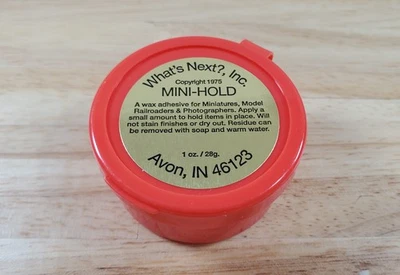 Mini Hold Wax by What's Next Red Jar 1oz Holds Miniatures in Place - Image 1 of 2