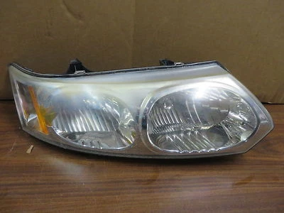 SATURN ION 03-07 2003-2007 ФАРА ПАССАЖИРСКАЯ ПРАВАЯ ОТ ОРИГИНАЛЬНОГО ПРОИЗВОДИТЕЛЯ СРЕДНЯЯ ЧЕТКОСТЬ ОБЪЕКТИВА - Изображение 1 из 4