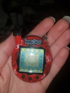 Tamagotchi Connection Red And Black Butterflies V4.5 2004 - Picture 1 of 2