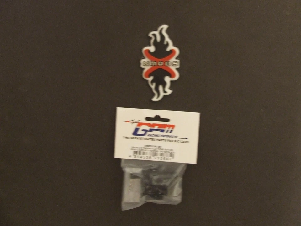 XMODS EVO TOURING GPM ALLOY REAR GEARBOX FRONT COVER XME013A BLACK NEW ALUMINUM - Image 1 of 2