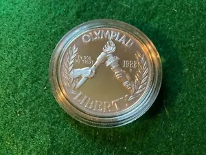 Moneta commemorativa da 1 dollaro in argento Olimpiadi 1988, colpo di prova - T26 - Foto 1 di 2