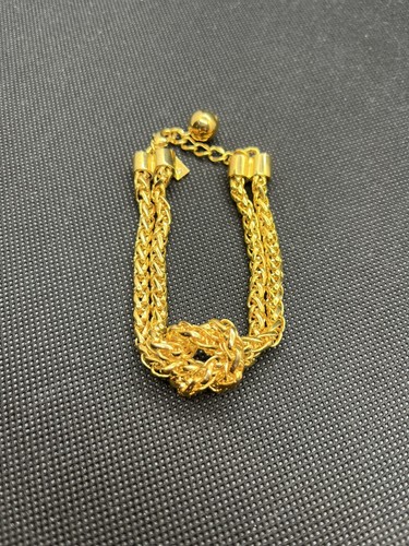 Bracciale Kate Spade New York annodato tono oro