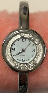Wristwatch Silver Tone Cuff Band Floating Crystals Round White Face - Picture 1 of 7