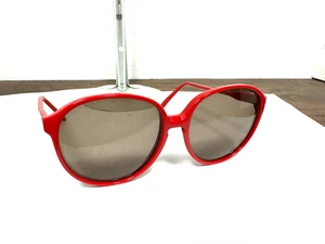 Gafas de sol vintage Luxotica con monturas rojas Italia - Imagen 1 de 6