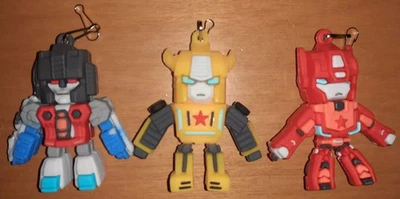3 MODEL PORTACHIAVI ROBOT TRASFORMERS AUTOBOT RODIMUS PRIME,BUMBLEBEE,STARSCREAM - Immagine 1 di 4