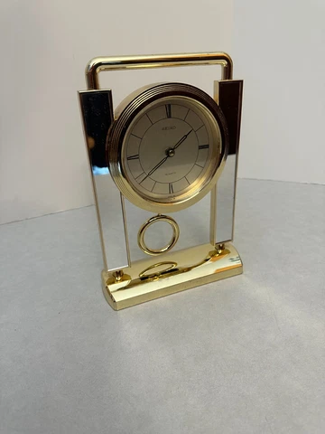 Seiko Mantel or Desk Clock - Pendulum - Gold with Mirrors - Plastic - QPW142G Cover