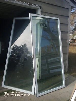One Gliding Patio Door With Screen And Hardware Also 2 Egress Windows - Image 1 of 4