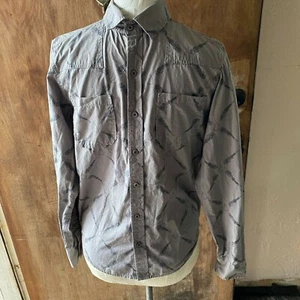 CAMISA XS con botones Hot Topic Assassin's Creed Le - Imagen 1 de 7