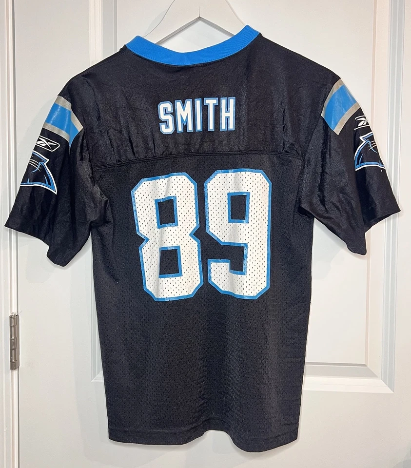 Camiseta Nike Carolina Panthers Steve Smith VTG #89 Youth L 14-16 NFL preta azul - Imagem 1 de 4