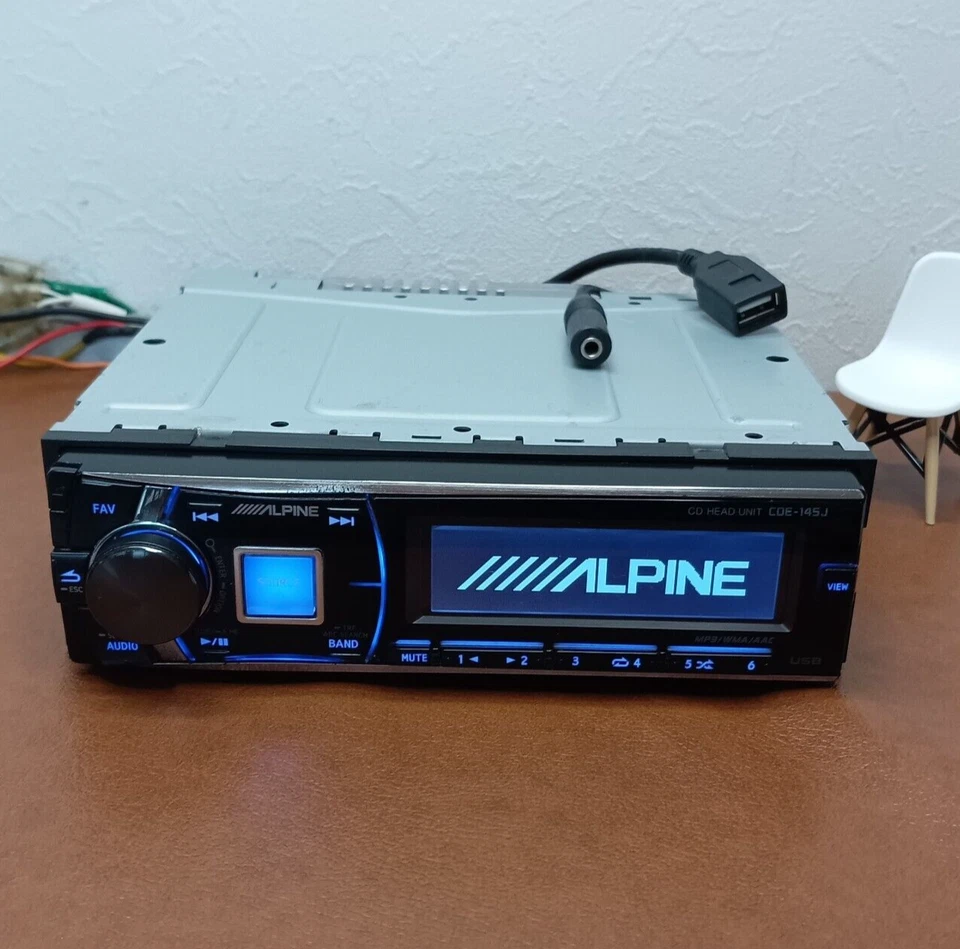 Alpine CDE-145J Ricevitore CD audio per auto 1DIN ingresso USB AUX testato sp... - Immagine 1 di 4