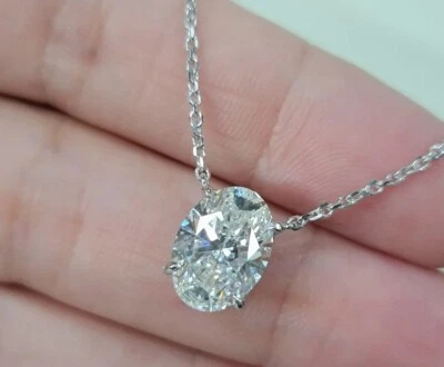 RARO Colgante solitario de diamantes talla ovalada tratado blanco roto de 5,50 quilates en plata 925 Foto 1 de 4