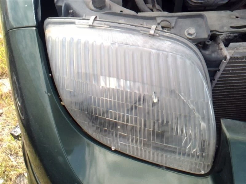 Faro derecho pasajero compatible con 95-02 SUNFIRE 14065697 Foto 1 de 4