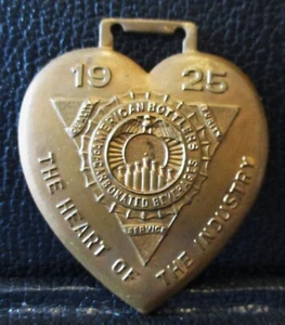 1925 American Bottlers Carbinated Beverages Pocket Watch Fob Heart of Industry - Picture 1 of 3