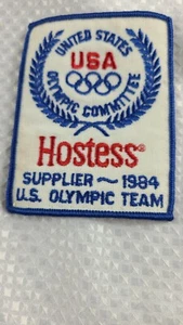 Vintage 1984 Olympics Hostess Cakes Bakery Jacket Patch Employee Work Uniform - Picture 1 of 4