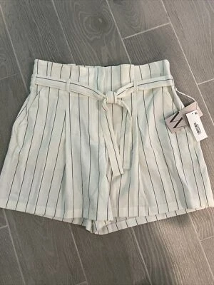 Pantalones cortos Worthington para mujer 10 elegantes texturizados con bolsillos laterales para cinturón Foto 1 de 4