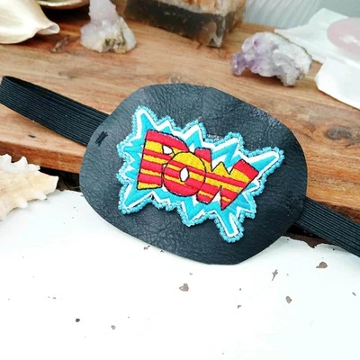 Comic POW Embroidered Beaded Eye Patch, Adjustable Vision Ocular Aid, Costume - Image 1 of 4