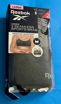 PACK DE 2 SUJETADORES DEPORTIVOS SIN COSTURAS REEBOK DAMAS TALLA L COPAS EXTRAÍBLES SOPORTE MEDIO Foto 1 de 3
