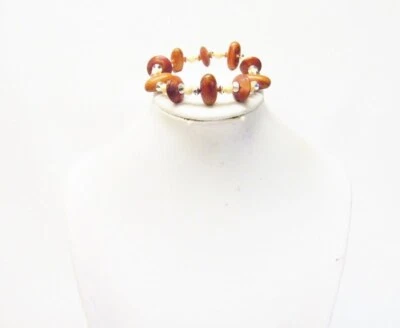 Brazalete marrón hinchado ovalado/donut con cuentas redondas de madera beige Foto 1 de 4