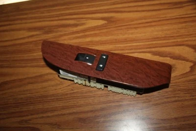 Interruptor de ventana delantera con bisel Chevy Tahoe/Yukon/Suburban/Avalanche P/S 2007-09 Foto 1 de 3