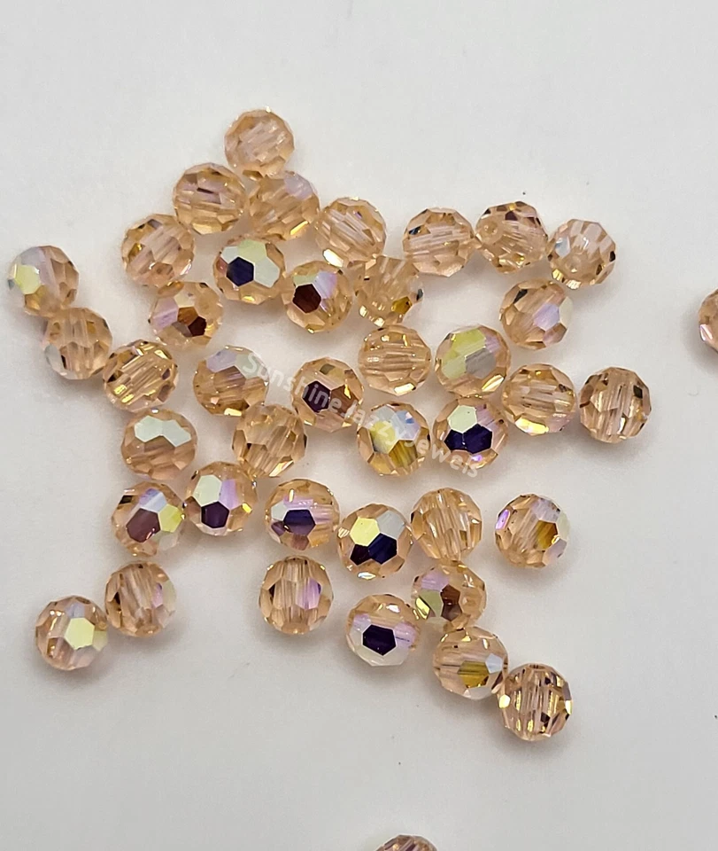 24pc Swarovski Crystal Light Peach AB 4mm Faceted Round 5000 Beads; Iridescent - Image 1 of 1