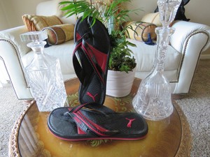 puma red and black slippers