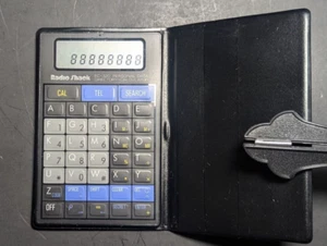 RadioShack Mity Thin Calculator & Directory EC-320 Works Great! - Picture 1 of 7