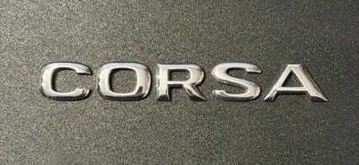 VAUXHALL CORSA - CAR BADGE / EMBLEM - WILL REQUIRE NEW ADHESIVE TO REAR - Image 1 of 2