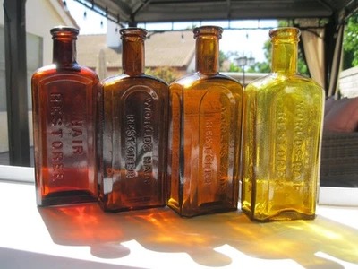 Lote de 4 Botellas RESTAURADOR DE CABELLO Mrs. S. A. Allen’s / W.C Montgomery’s Foto 1 de 4