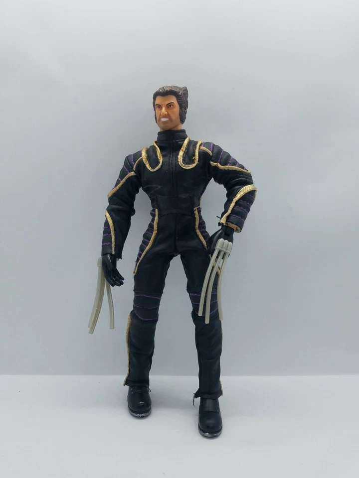 Boneco Marvel Comics Wolverine Logan 9,5 polegadas ouro preto. pano de vinil articulado - Imagem 1 de 4