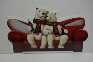 COCA COLA POLAR BEARS WITH SCARVES ON COUCH DIE CUT STEEL ENAMEL SIGN 10"HX 17"W - Picture 1 of 3