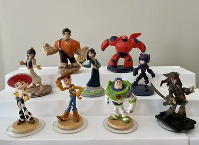 Lote de 9 figuras de personajes de Disney Infinity ~ Woody, Buzz, Ralph, Jack Sparrow Foto 1 de 4