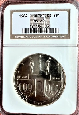 1984-P OLYMPICS COMMEMORATIVE DOLLAR COIN GRADED BY NGC MS69 - Image 1 of 2