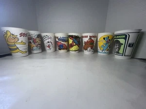 8 Vintage 7 elf Tassen 70er Jahre Hanna/Barbera Marvel Reggie Johnson usw. - Bild 1 von 13