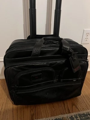 AUTÉNTICO TUMI Maletín Grande de Cuero Negro con Ruedas Extendidas para Laptop 96127DH Foto 1 de 4