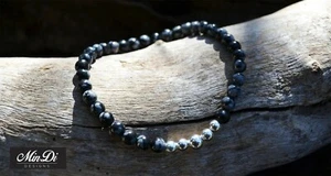 Pulsera elástica con plata esterlina, copo de nieve de obsidiana. - Imagen 1 de 4