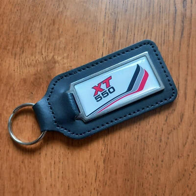 For Yamaha XT 550 Leather Key Keyrings Petrol Tank Decal XT550 White NOS Parts - Image 1 of 2