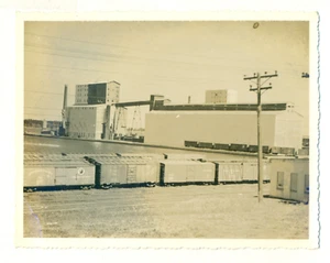 Vintage Snapshot Many Trains with some buildings in the background VP1. - Picture 1 of 3