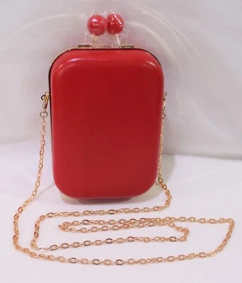 Bolso lateral rojo Elizabeth Arden con correa de hombro de cadena Foto 1 de 4
