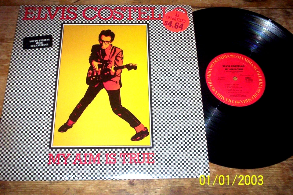 ELVIS COSTELLO ( MY AIM IS TRUE ) ORIG 1977 DEBUT vinyl LP in shrink w/ Hype NM- - Image 1 of 2