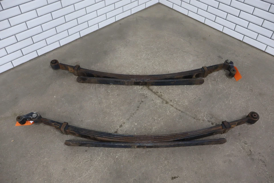 01-10 Chevy GMC Silverado Sierra 2500HD OEM Rear Leaf Springs (Pair Left/Right) - Image 1 of 4