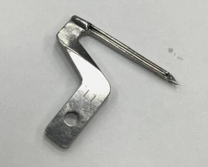 Lower Looper 1250003-441 for Toyota 6300, 6600/White; Pfaff 4764, Huskylock 901 - Picture 1 of 3