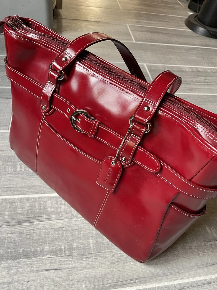 Hermoso estuche de cuero para computadora portátil McKlein rojo Foto 1 de 4