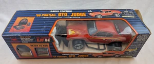 New Bright 1969 Pontiac GTO Judge RC car 1/16 27 MHz w/ battery charger OPEN BOX - Picture 1 of 9