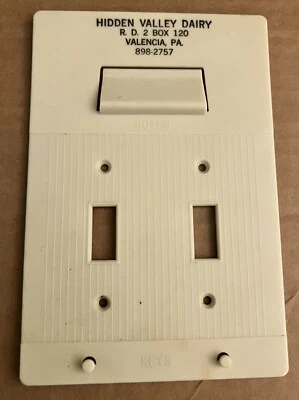 Cubierta de placa de interruptor de luz vintage HIDDEN VALLEY DAIRY con soporte para billetes Valencia PA Foto 1 de 3